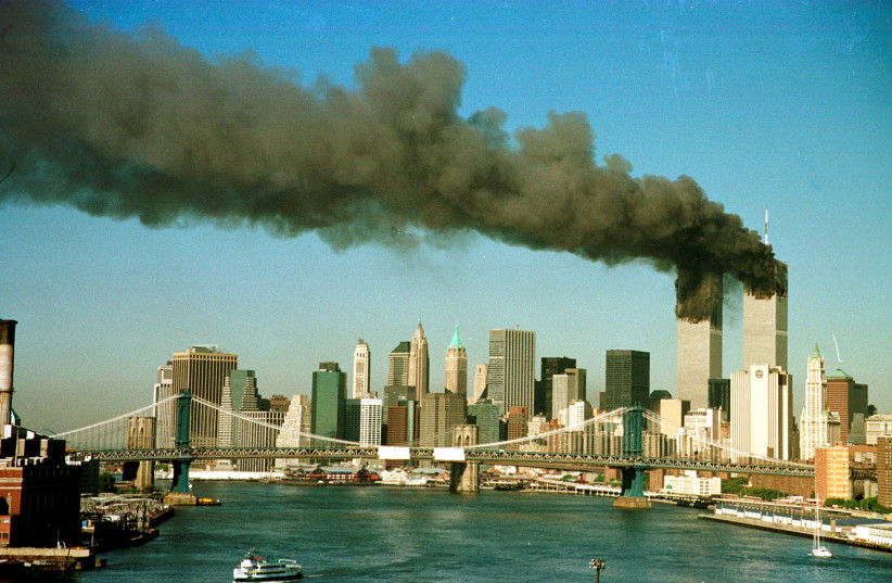  THE TWIN Towers burn (credit: Brad Rickerby/File/Reuters)