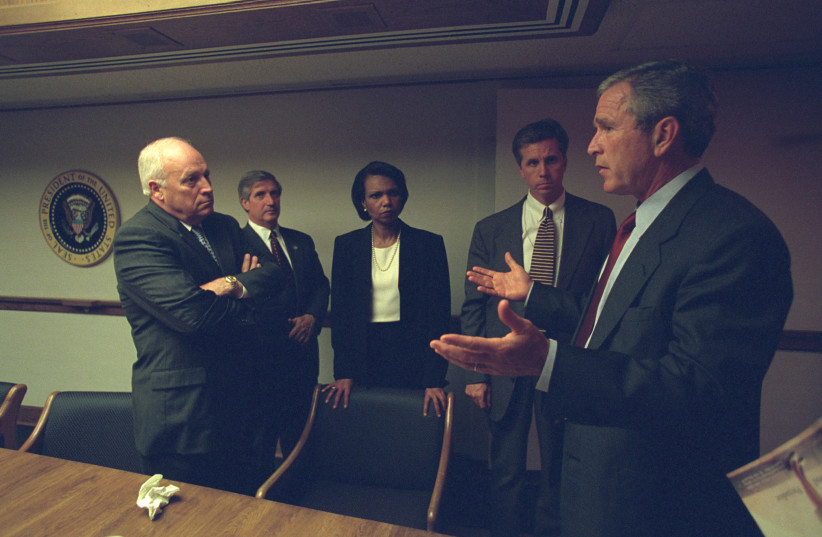 U.S. President George Bush (R) is pictured with Vice President Dick Cheney (L) and senior staff in the President's Emergency Operations Center in Washington in the hours following the September 11, 2001 attacks, in this U.S. National Archives handout photo obtained by Reuters July 24, 2015. (credit: U.S. NATIONAL ARCHIVES/HANDOUT VIA REUTERS/FILE PHOTO)