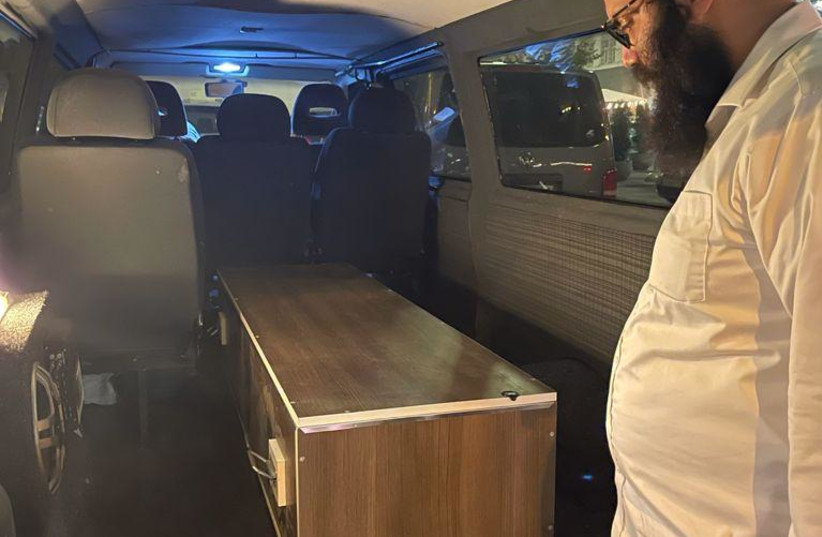  A coffin containing the body of Rabbi Avraham Levy, who died in a car crash in Ukraine after Rosh Hashanah, is seen in a car on September 12, 2021. (credit: ZAKA)