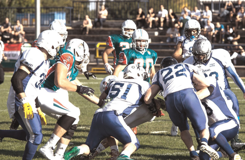  Israel tackle football story by Jerusalem Post Sports Staff – Picture of Israel-vs-Hungary (credit: Tamás Battyáni/Courtesy)