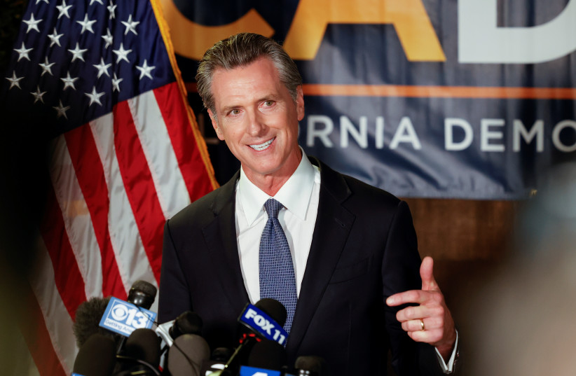  California Governor Gavin Newsom speaks after the polls close on the recall election, at the California Democratic Party headquarters in Sacramento, California, US, September 14, 2021.  (credit: REUTERS/FRED GREAVES)