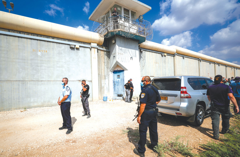  POLICE OFFICERS and prison guards stand outside the Gilboa jail following the escape by Palestinian security prisoners. (photo credit: FLASH 90)