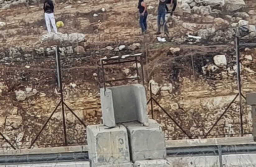  Palestinians throwing rocks at Border Police officers in Beitunya in the West Bank. (credit: ISRAEL POLICE)