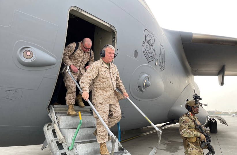 U.S. Marine Corps Gen. Frank McKenzie, the commander of U.S. Central Command, arrives at Hamid Karzai International Airport, in Kabul, Afghanistan, in this photo taken on August 17, 2021 and released by U.S. Navy on August 18, 2021. (photo credit: U.S. NAVY/CENTRAL COMMAND PUBLIC AFFAIRS/CAPT. WILLIAM URGAN/HANDOUT VIA REUTERS)