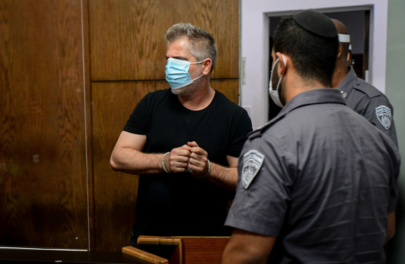  The driver suspected hitting and killing a 12-year-old boy who was riding his bike on Route 4 near Givat Shmuel on Yom Kippur, arrives for a court hearing at the Tel Aviv Magistrate's Court, September 17, 2021.  (credit: AVSHALOM SASSONI/FLASH90)