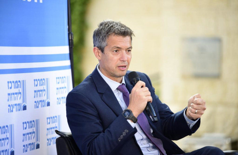  Communications Minister Yoaz Hendel speaking at a conference. (photo credit: Boaz Perelstein Courtesy of the Hartman Institute)