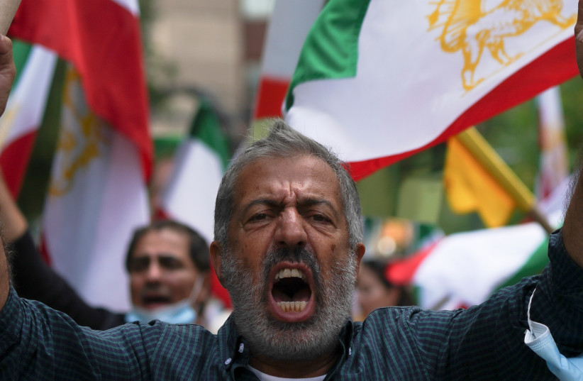  Iranian Americans rally against Ebrahim Raisi outside the United Nations headquarters during the 76th Session of the U.N. General Assembly, in New York, U.S., September 21, 2021. (credit: REUTERS/DAVID 'DEE' DELGADO)