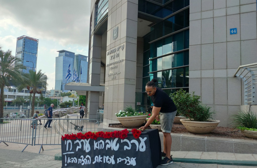  'Darkenu' activists protest the surge in Arab crime leading in front of the Prime Minister's Office in Tel Aviv during the #Arab_Lives_Matter movement, September 22, 2021 (credit: DARKENU)