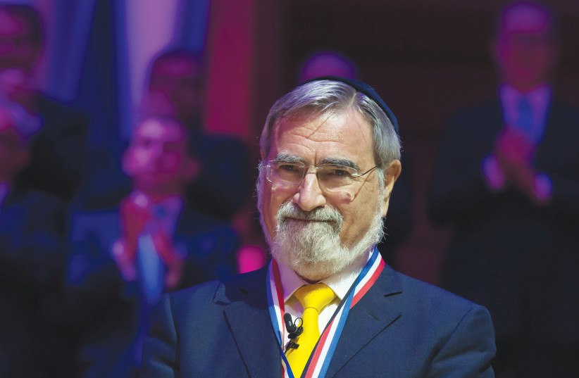  BRITISH CHIEF rabbi Lord Jonathan Sacks is honored at the 2016 Templeton Prize ceremony. Most of the translation was completed by Sacks, though an esteemed committee finished portions after his passing. (credit: Catholic Church England Wales/Flickr)