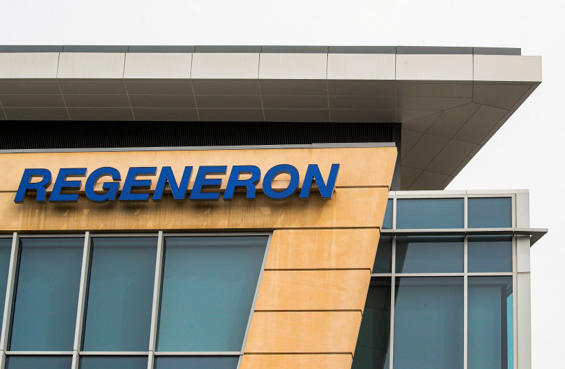  The Regeneron Pharmaceuticals company logo is seen on a building at the company's Westchester campus in Tarrytown, New York, US September 17, 2020. (photo credit: BRENDAN MCDERMID/REUTERS)