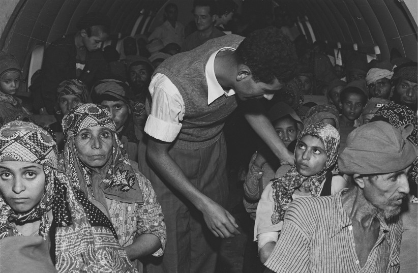  YEMENITE JEWS are seen on a plane traveling to Lod airport as part of Operation Magic Carpet in 1949 (photo credit: TEDDY BRAUNER/GPO)
