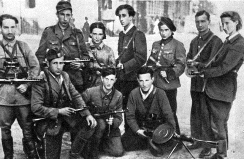 Abba Kovner (back row, center) with members of the Fareynikte Partizaner Organizatsye (The FPO – Eng: United Partisan Organization). (credit: Wikimedia Commons)