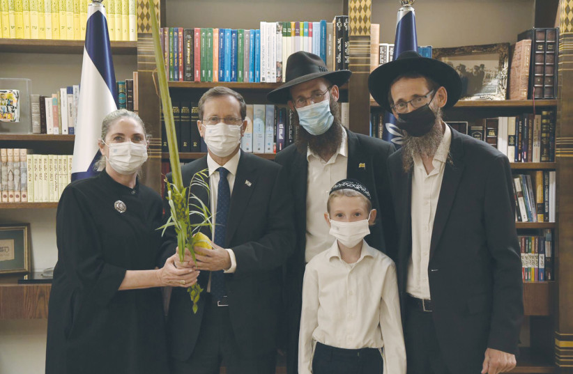  MICHAL HERZOG, President Isaac Herzog, Avraham and Israel Maidanchik and Avraham's son. (photo credit: KOBI GIDEON/GPO)