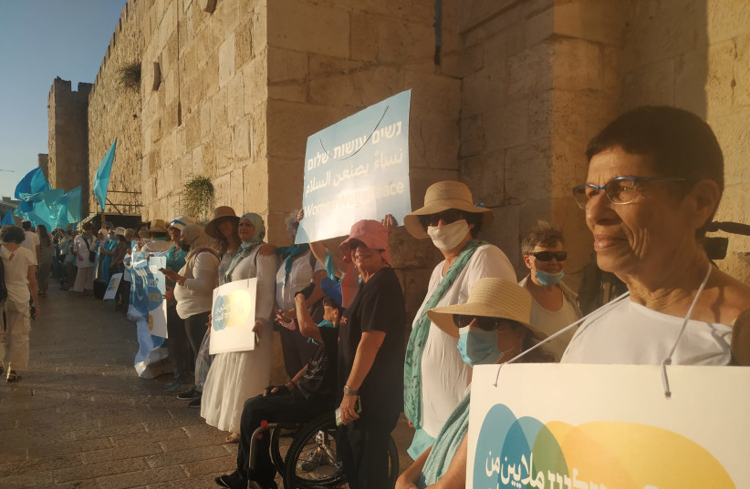  Women forming a human chain in the Old City (photo credit: WOMEN WAGE PEACE)