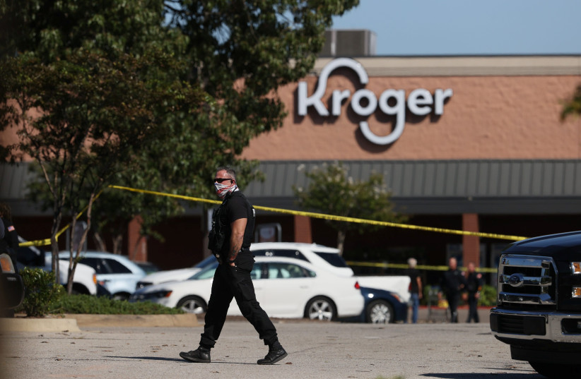 Emergency personnel respond to a shooting at a Kroger supermarket in suburban Memphis, Tennessee, U.S., September 23, 2021. (photo credit: JOE RONDONE/THE COMMERCIAL APPEAL/USA TODAY VIA REUTERS)