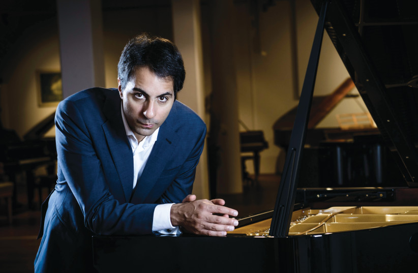  PIANIST-CONDUCTOR Saleem Abboud Ashkar  and the Polyphony project bring together young Israeli and Palestinian instrumentalists.  (photo credit: LUDMIELA JERMEIS)