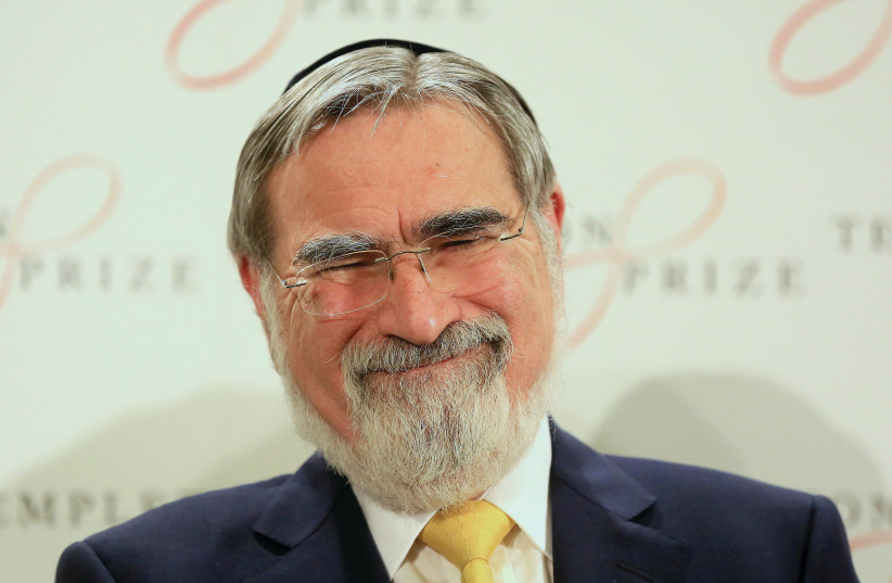  Rabbi Jonathan Sacks laughs during a news conference after being awarded the 2016 Templeton Prize in London (photo credit: PAUL HACKETT/REUTERS)
