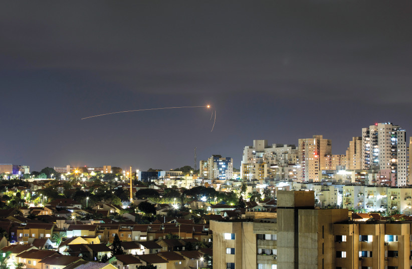Iron dome intercepts a rocket over Ashkelon on September 11, 2021. (photo credit: AMIR COHEN/REUTERS)