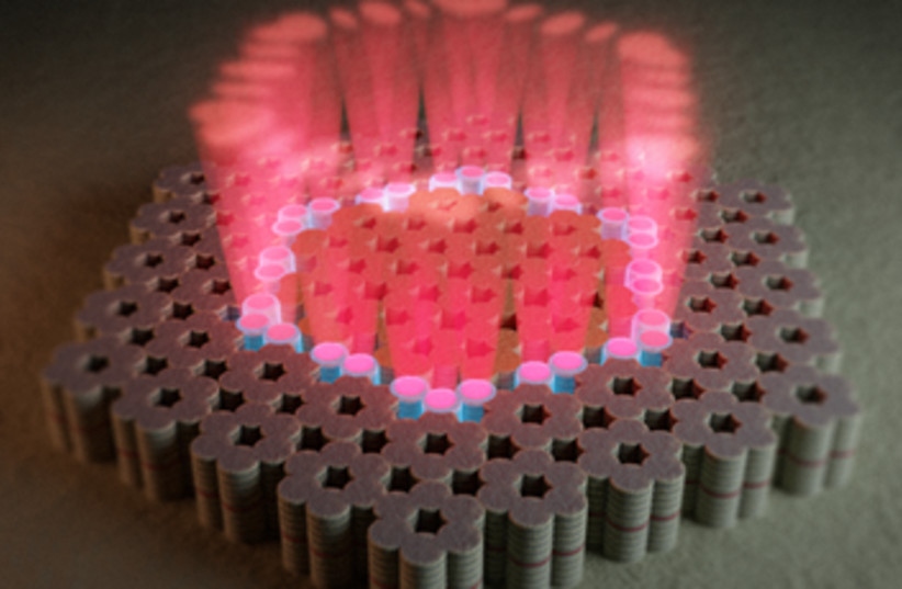  A single coherent light beam (pink) is emitted by an array of 30 individual lasers. (photo credit: SimplySci Animations)