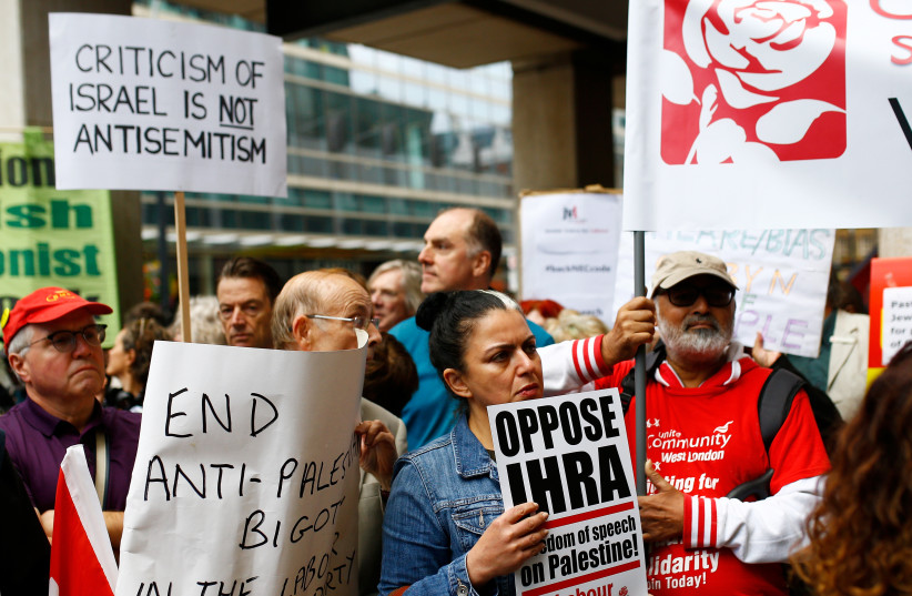  Demonstrators take part in protests outside a meeting of the National Executive of Britain's Labour Party which will discuss the party's definition of antisemitism, in London, September 4, 2018 (credit: REUTERS/HENRY NICHOLLS)