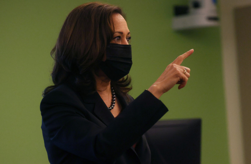  U.S. Vice President Kamala Harris talks with students during a visit to George Mason University to discuss voting rights and registration in Fairfax, Virginia, (photo credit: LEAH MILLIS/REUTERS)