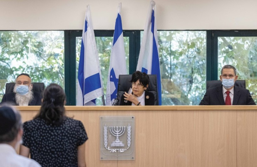  MERON Commission chairwoman and former chief justice Miriam Naor and her team are seen in August accepting testimony in Jerusalem. (photo credit: YONATAN SINDEL/FLASH90)