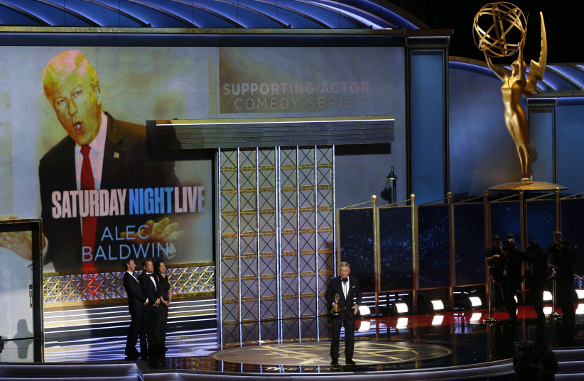  Alec Baldwin accepts the award for Outstanding Supporting Actor in a Comedy Series for "Saturday Night Live." (photo credit: REUTERS/MARIO ANZUONI)