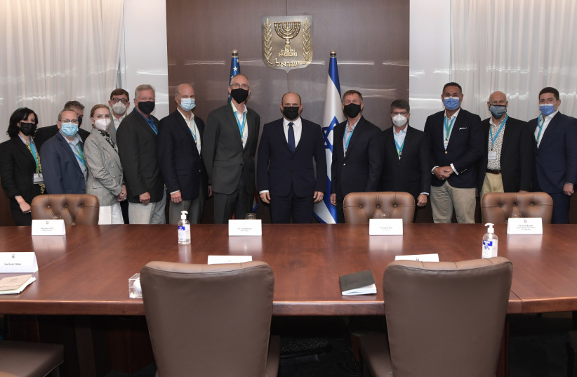  Prime Minister Naftali Bennett meeting with the Jewish Institute for National Security (JINSA) delegation, October 3, 2021. (credit: KOBI GIDEON/GPO)