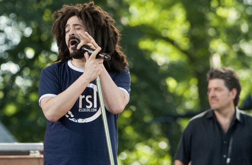  ADAM DURITZ, lead singer for Counting Crows, performs o in New York’s Central Park in 2012. (photo credit: KEITH BEDFORD/REUTERS)