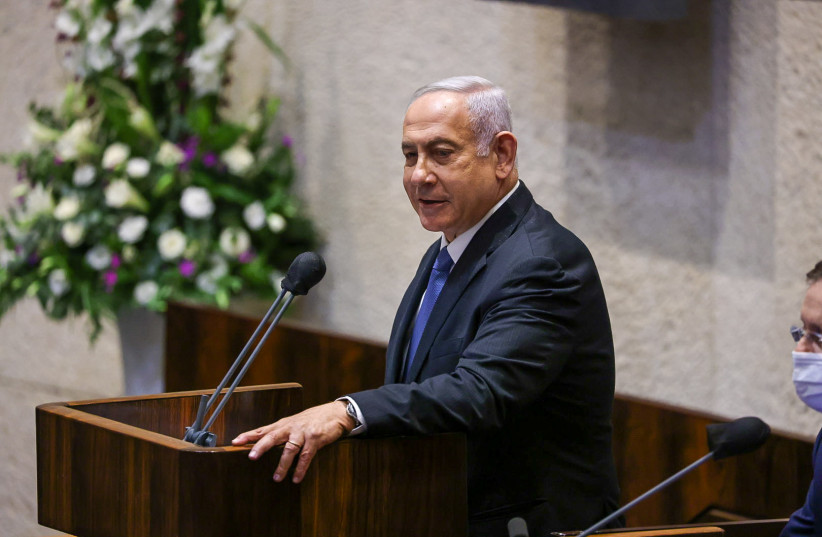  Opposition leader Benjamin Netanyahu speaking in the Knesset. (photo credit: NOAM MOSKOVICH)