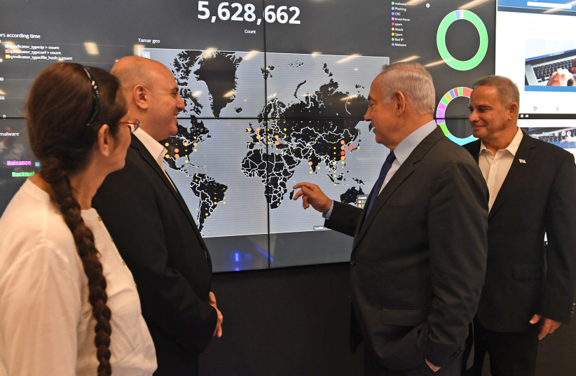 FORMER PRIME minister Benjamin Netanyahu checks in with Israeli Cyber Energy Response Team as the Cyber Park in Beersheba in 2017. (credit: KOBI GIDEON/GPO)