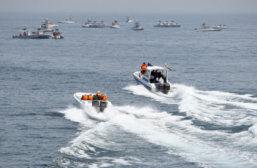 Iranian boats take part in naval war game in the Persian Gulf and the Strait of Hormuz southern Iran April 22, 2010. Iran's Revolutionary Guards successfully deployed a new speed boat capable of destroying enemy ships as war games began on Thursday in a waterway crucial for global oil supplies, Iran (photo credit: REUTERS/FARS NEWS)