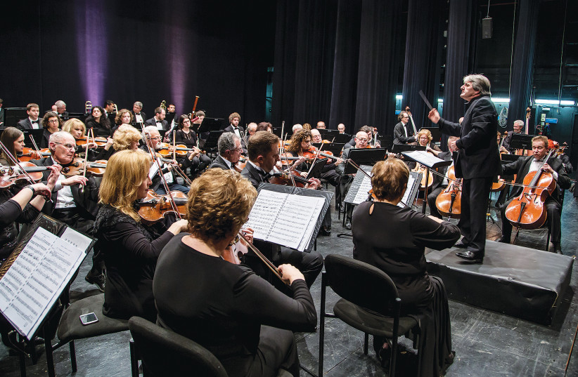  THE ISRAEL Chamber Opera Orchestra with conductor Vag Papian. (photo credit: MARK ZHALKOVSKY)