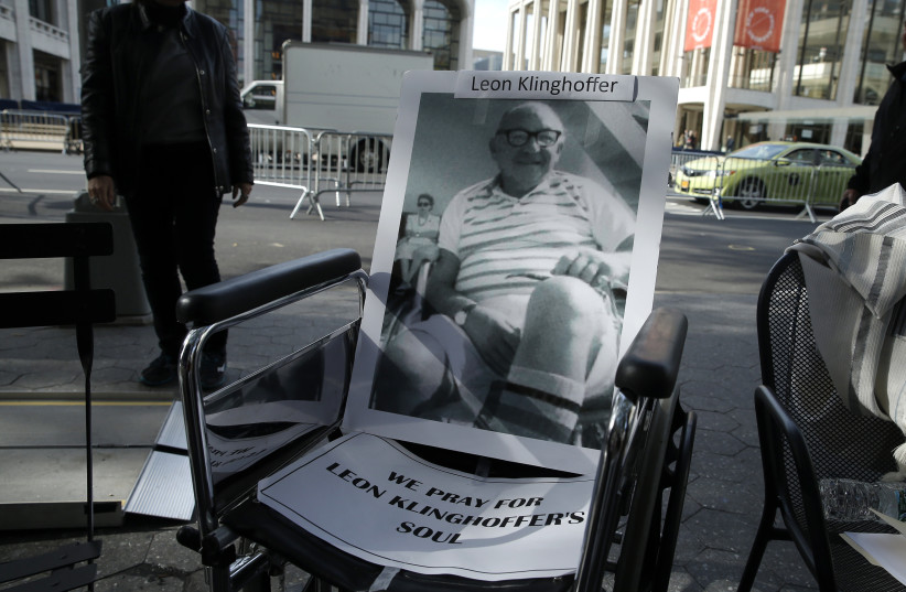  Wheelchair with a photograph of the late Klinghoffer in it sits across from Lincoln Center and the New York Metropolitan Opera ahead of a planned demonstration, in New York (photo credit: REUTERS)