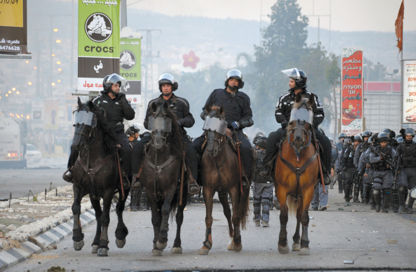 ISRAEL POLICE officers were attacked in Kafr Kassem by members of the city’s internal security forces last week.