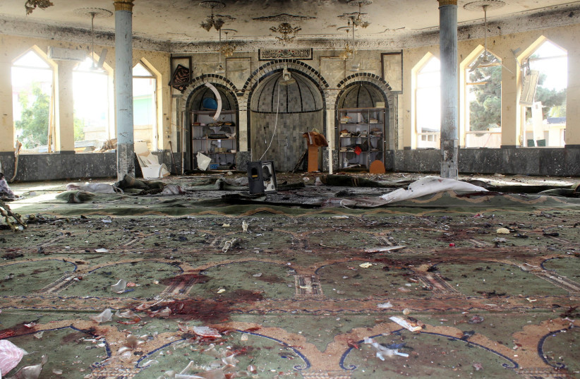  A view shows a mosque after a blast, in Kunduz, Afghanistan October 8, 2021 (credit: REUTERS)