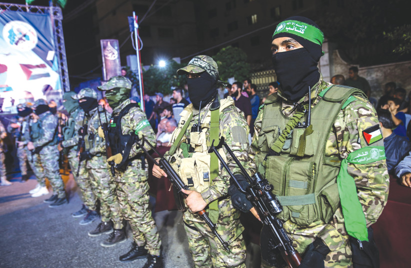  MEMBERS OF the Hamas Izzadin al-Qassam Brigades take part in a military event in Gaza City last week. (photo credit: ATIA MOHAMMED/FLASH90)