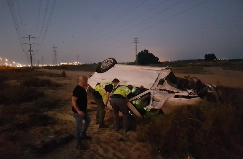  A crashed car is seen after the deadly accident on Highway 4 on October 10, 2021. (photo credit: ISRAEL POLICE)