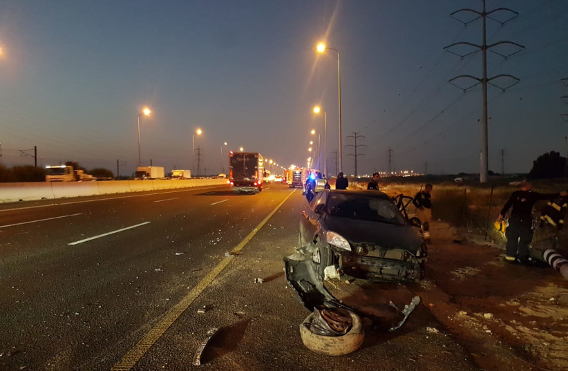  A crashed car is seen after the deadly accident on Highway 4 on October 10, 2021. (credit: ISRAEL POLICE)