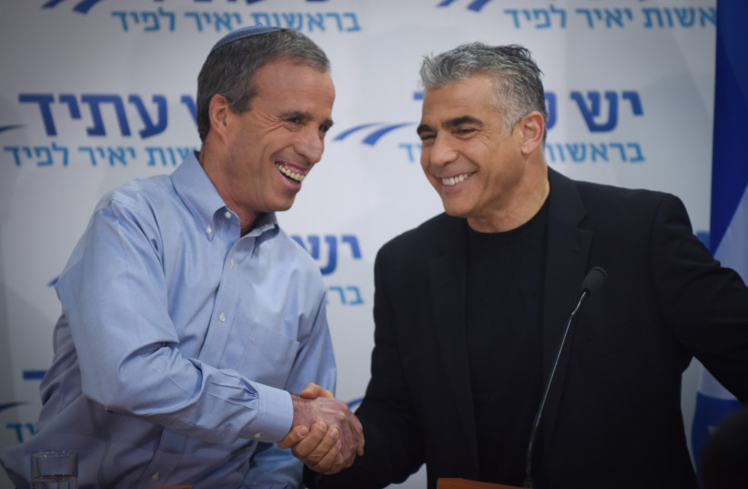  Leader of the "Yesh Atid" political party Yair Lapid (R) seen with MK Elazar Stern at a press conference in Tel Aviv,  on January 18, 2015 (photo credit: Ben Kelmer/FLASH90)