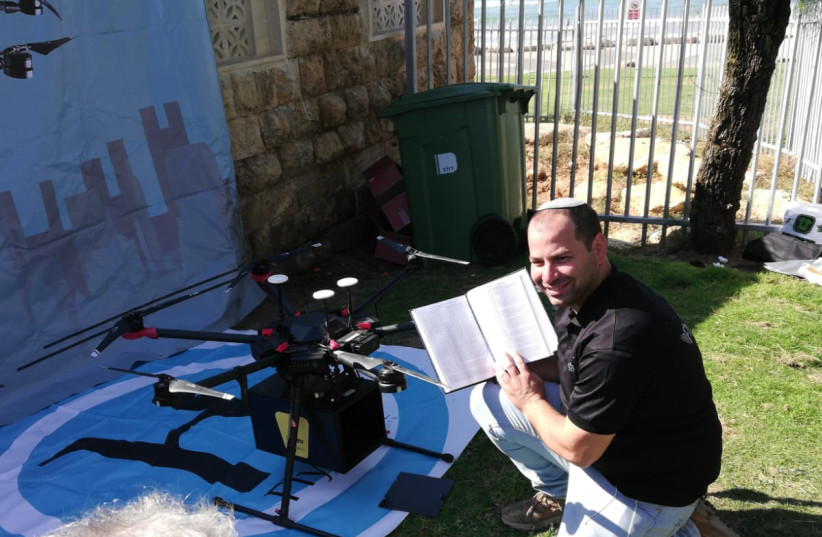  A drone delivers sushi to waiting recipients in the Tel Aviv area, October 11, 2021. (credit: ZEV STUB)