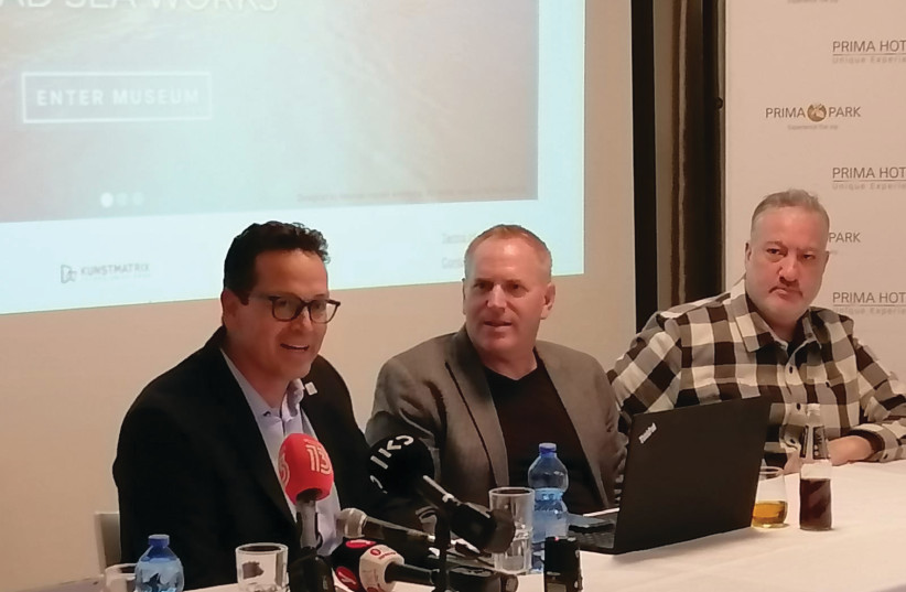  ARAD MAYOR Nisan Ben-Hamo (from left), Dead Sea Museum director Ari Leon Fruchter and famed photographer Spencer Tunick appear at a press conference in Jerusalem. (photo credit: HANNAH BROWN)