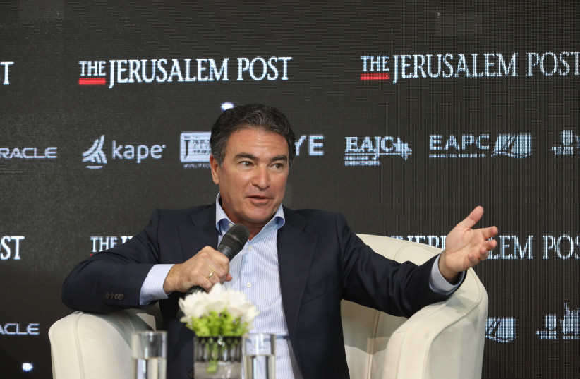  Former Mossad head Yossi Cohen is seen speaking at the Jerusalem Post annual conference at the Museum of Tolerance in Jerusalem, on October 12, 2021. (credit: MARC ISRAEL SELLEM/THE JERUSALEM POST)