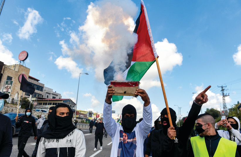  ISRAELI ARABS protest against violence, organized crime and recent killings within the Arab sector, in the town of Umm el-Fahm earlier this year. (photo credit: RONI OFER/FLASH90)