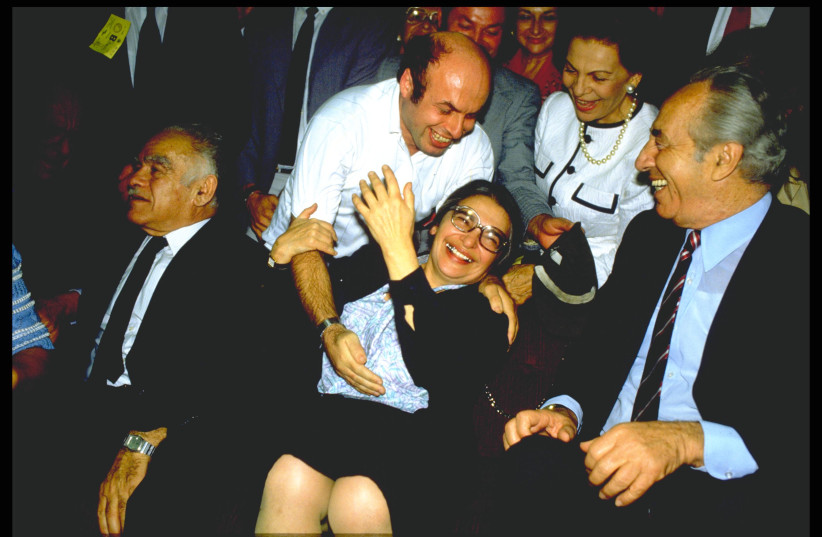  Ida Nudel is greeted upon her arrival at Ben-Gurion Airport by Natan Sharansky, flanked by Prime Minister Yitzhak Shamir and Foreign Minister Shimon Peres, on October 15, 1987. (photo credit: NATI HARNIK/GPO)