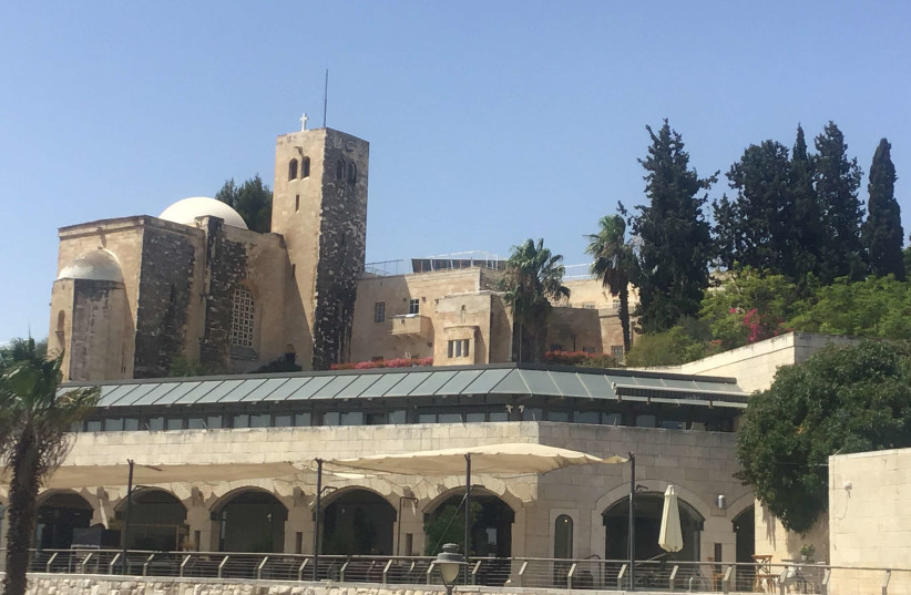  St. Andrew’s Scots Memorial Church is opposite the Old City walls of Jerusalem and above the Menachem Begin Heritage Center. (photo credit: PAUL CALVERT)