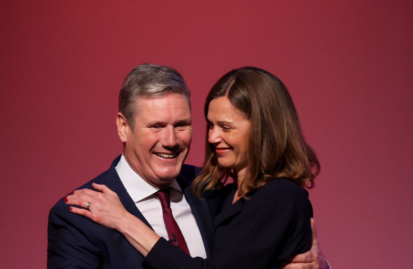  Britain’s Labour Party leader Keir Starmer with his Jewish wife Victoria at the annual conference in Brighton on September 29. (photo credit: HANNAH MCKAY/ REUTERS)
