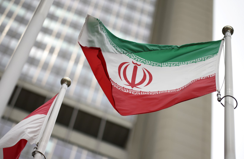  Iranian flag flies in front of the UN office building in Vienna (credit: REUTERS/LISI NIESNER/FILE PHOTO)