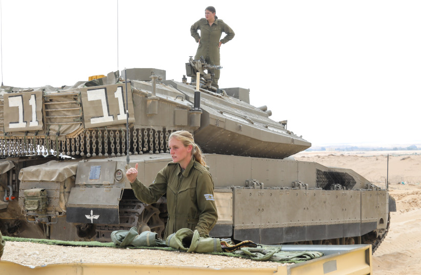 FEMALE TANK CREWS are deployed along  the border as part of a pilot program to  assess whether or not to integrate  women into the IDF’s Armored Corps (photo credit: MARC ISRAEL SELLEM)