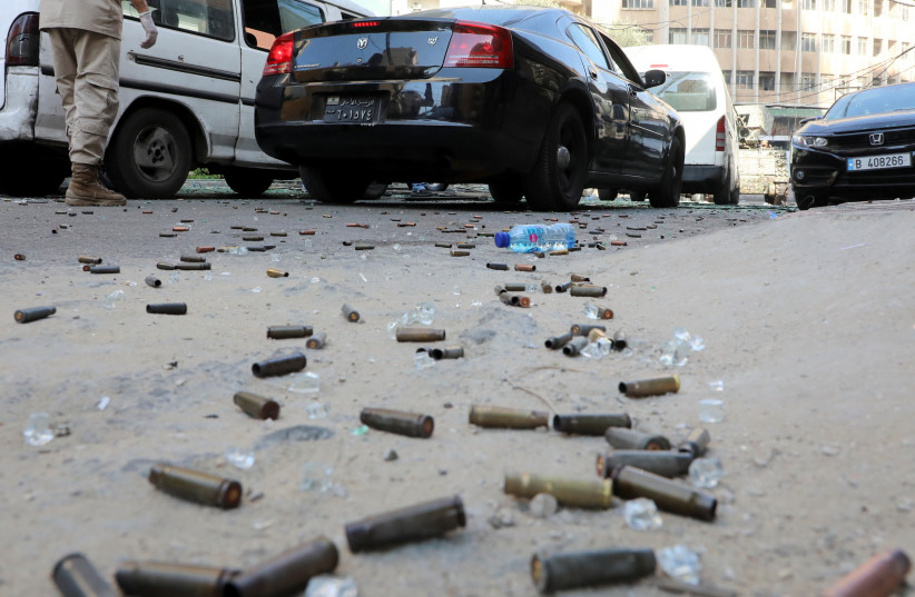  Gun shells are seen on the floor after gunfire erupted, in Beirut, Lebanon October 14, 2021.  (credit: REUTERS/MOHAMED AZAKIR)